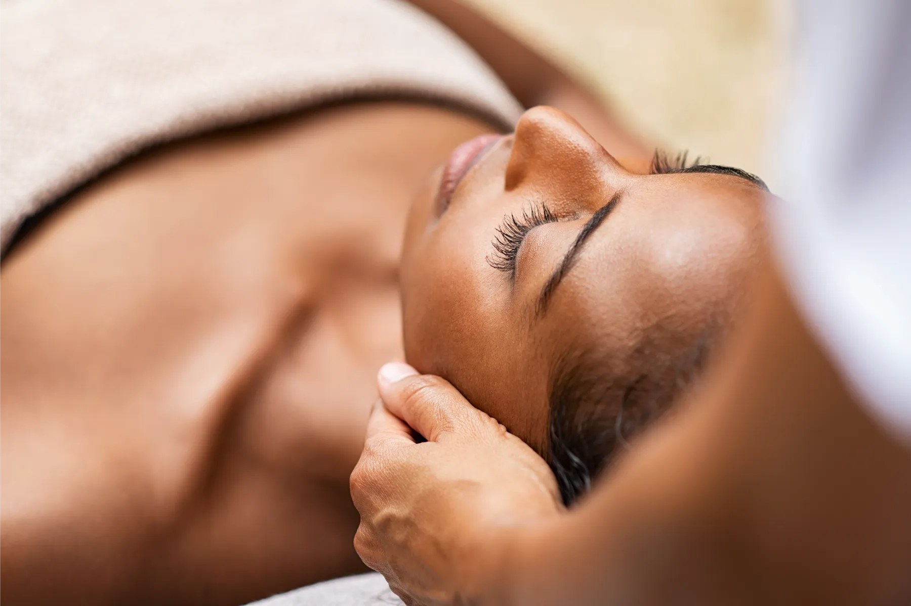 A Woman on Massage Therapy at Gentle Giant Care in Atlanta, GA and Beverly Hills, CA