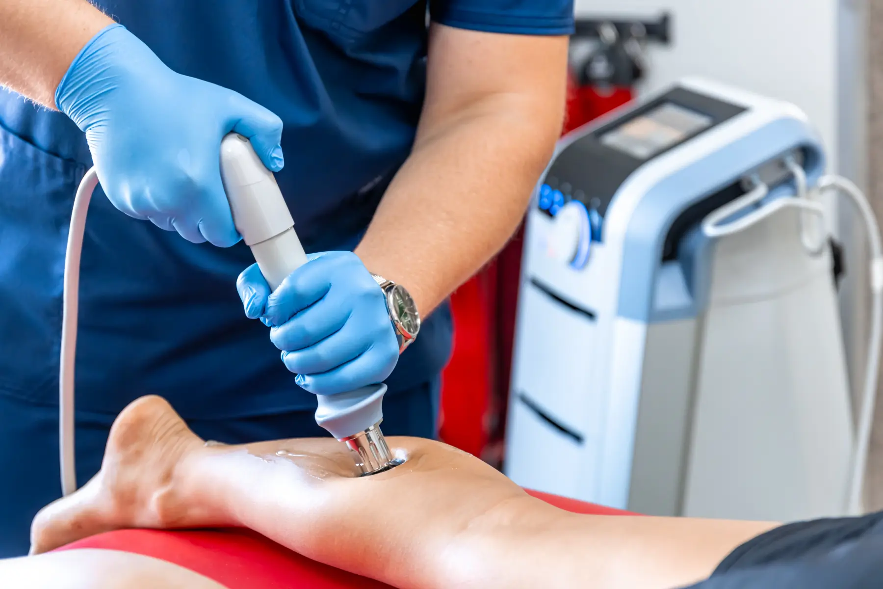A Man receiving Shockwave Therapy at Gentle Giant Care in Atlanta, GA and Beverly Hills, CA
