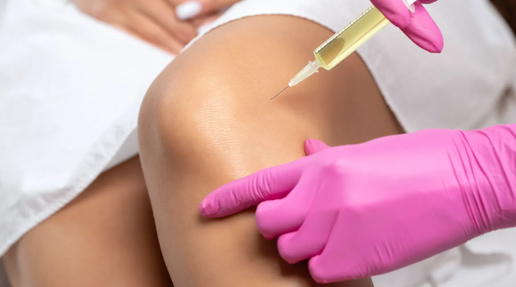 “Stem cell and PRP injections for joint therapy at Gentle Giant Care LLC in Palm Springs, California — a healthcare provider administering regenerative injections to a client’s joint to support healing, reduce pain, and improve mobility.”