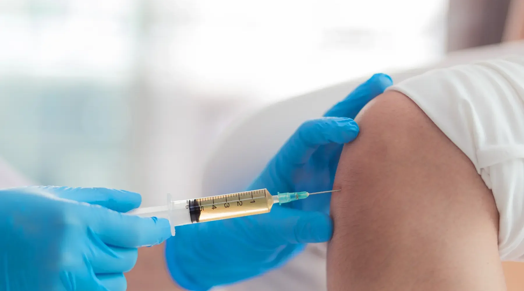 A patient receiving Stem Cell and PRP Injection at Gentle Giant Care in Atlanta, GA and Beverly Hills, CA